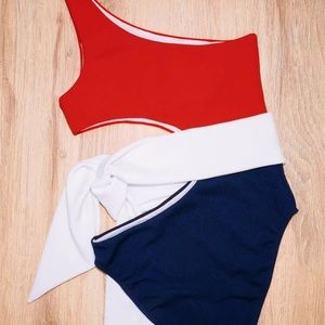 One shoulder, one-piece, cut-out bathing suit